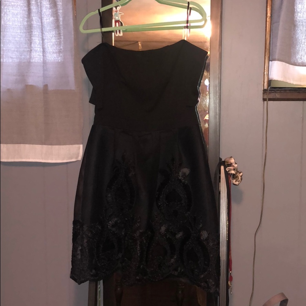 Francesca’s black off the shoulder dress